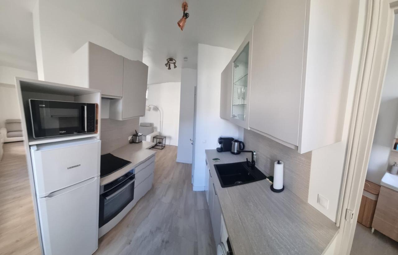 Appartement Luxueux Dans Maison Bourgeoise Parisienne لوفالوا بيريه المظهر الخارجي الصورة